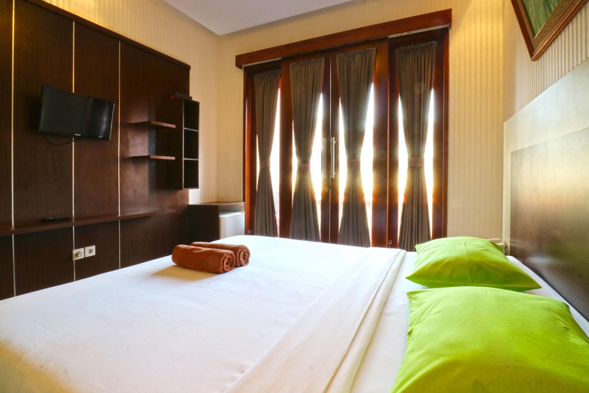 D'Astri Guesthouse Sanur Redpartner دنباسار المظهر الخارجي الصورة